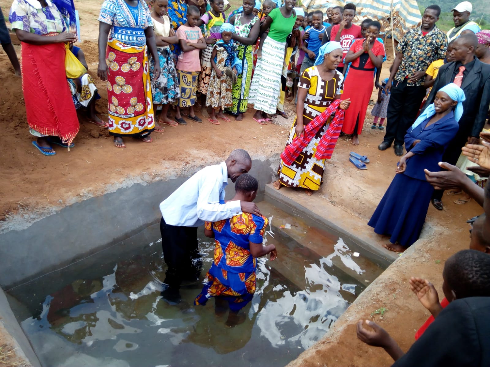 Baptism in an outdoor pool