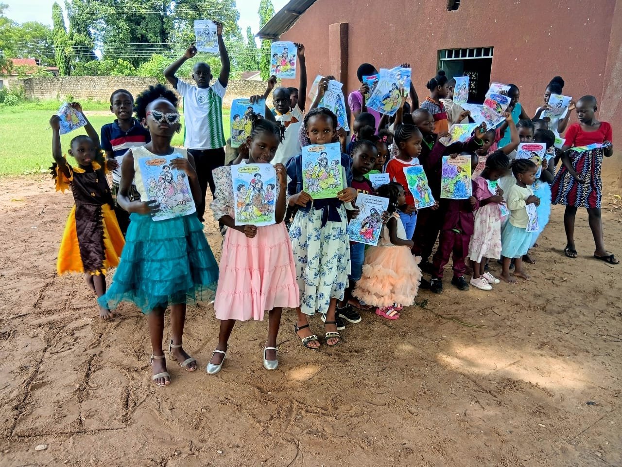 Children holding finished Bible coloring pages