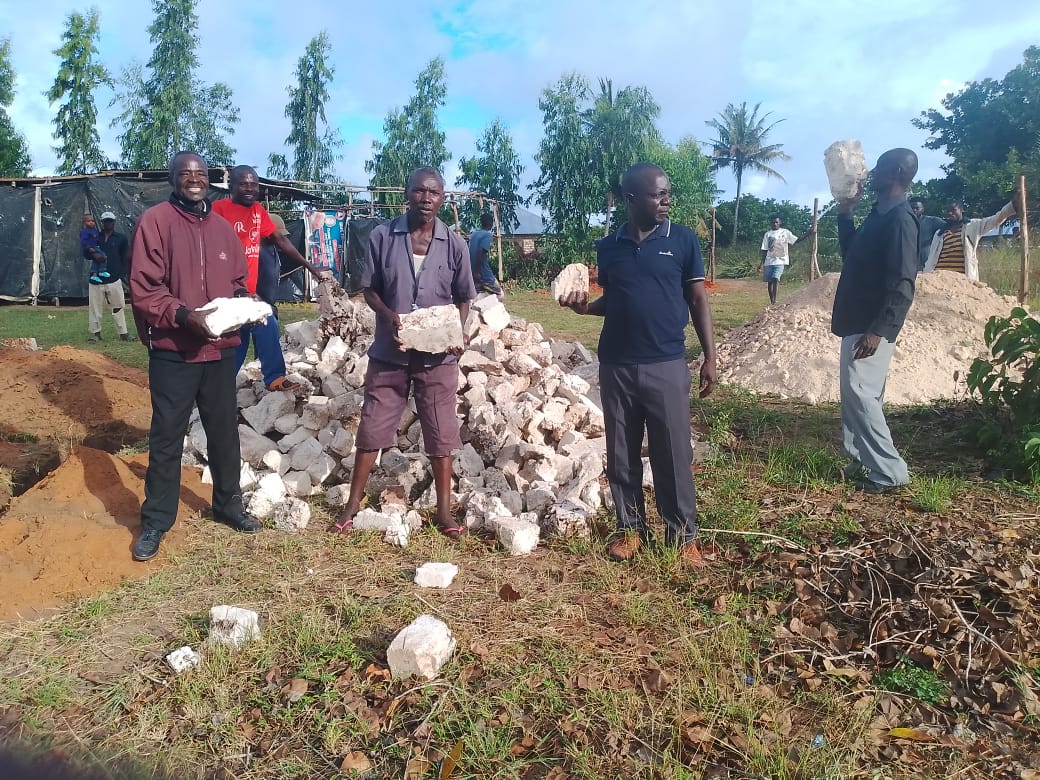 Men with building stones