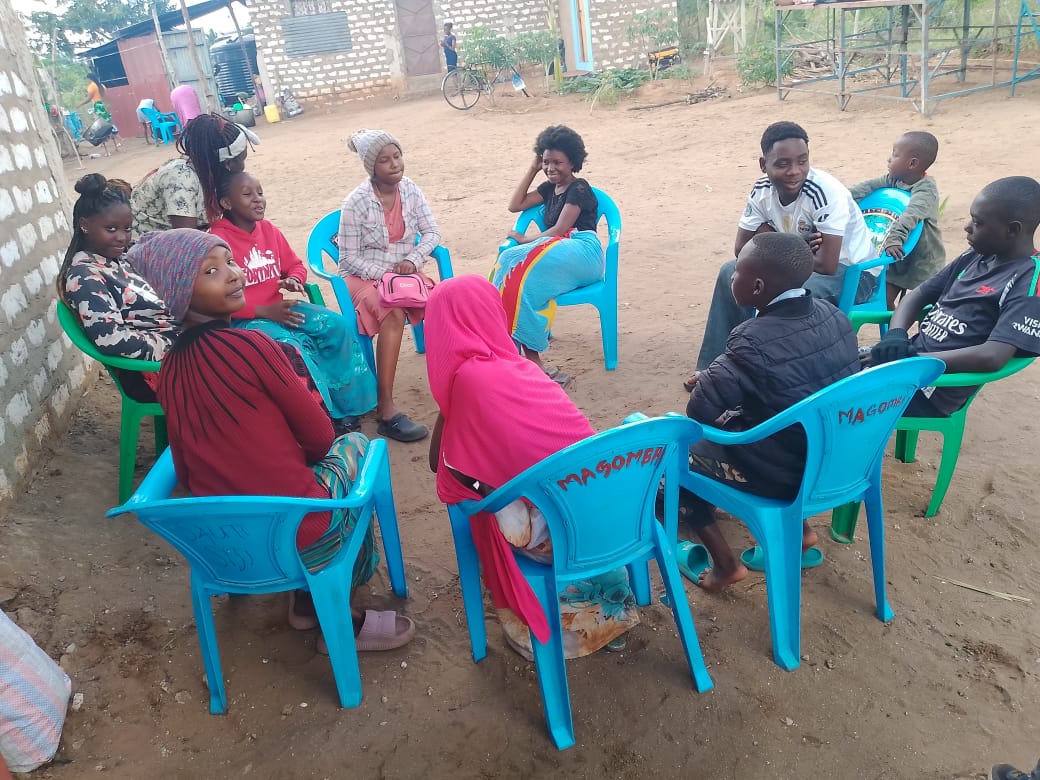 Youth sitting in a circle